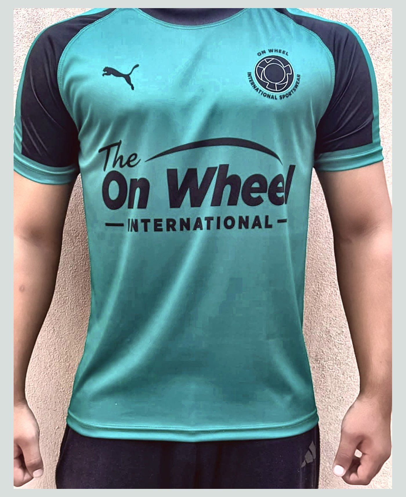 Custom training tee — our own range — made and photographed in sialkot — On Wheel International, Sialkot