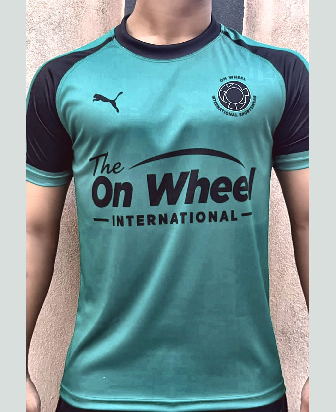 Custom training tee — our own range — made and photographed in sialkot — On Wheel International, Sialkot