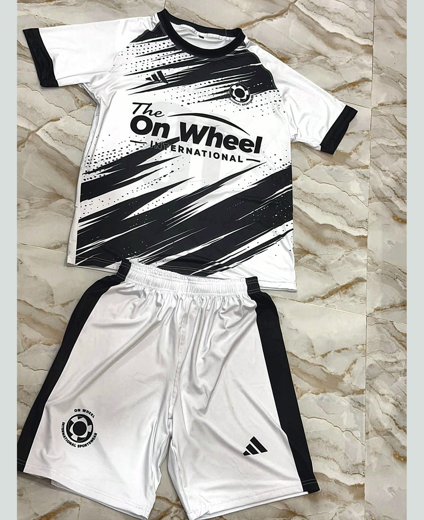 Custom jersey & short set — our own range — made and photographed in sialkot — On Wheel International, Sialkot